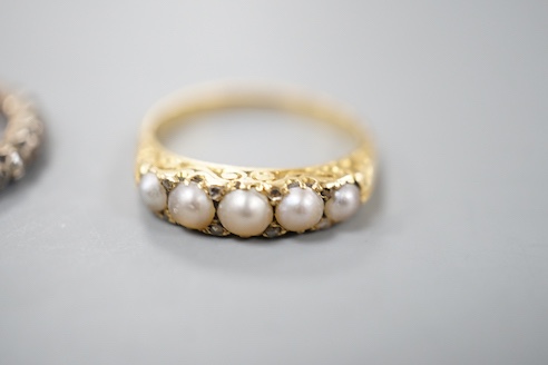 A 19th century yellow metal and rose diamond set full eternity ring, size L/M and an early 20th century yellow metal and graduated split pearl ring, size K/L, gross weight 5.8 grams.